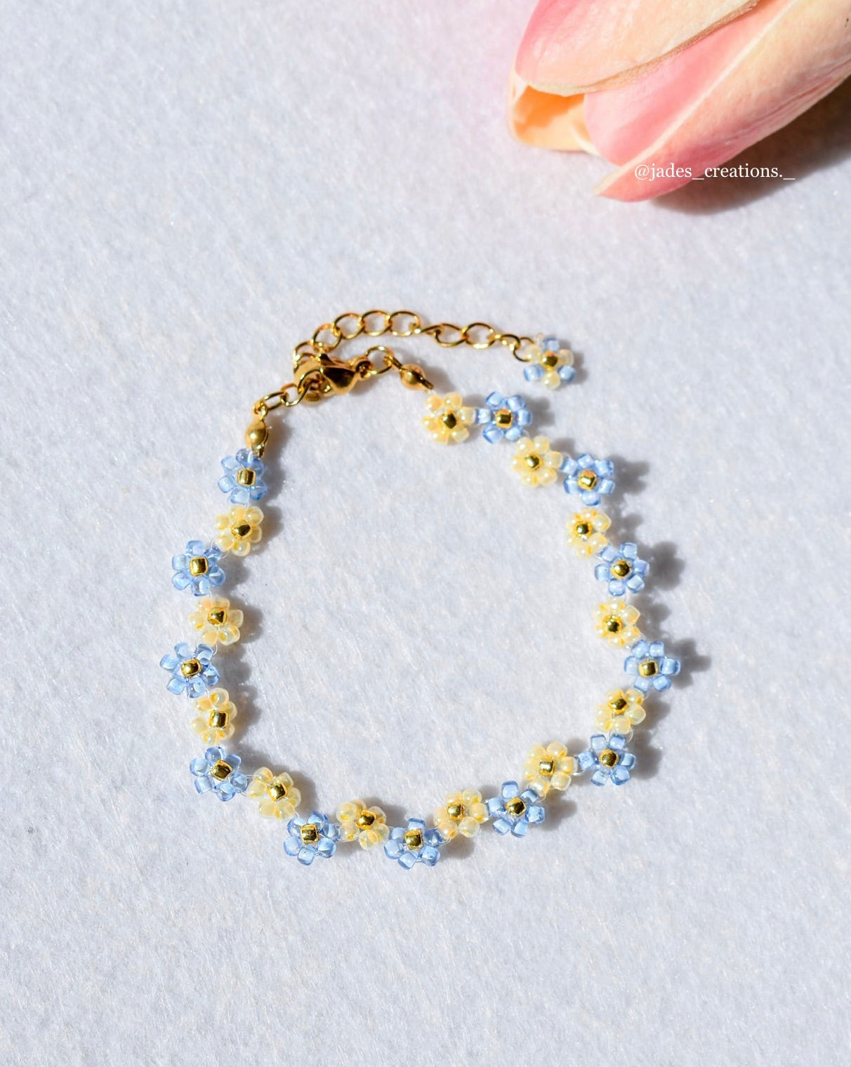 Bracciale floreale azzurro e giallo dorato