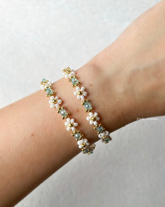 Bracciale floreale margherite perline azzurre trasparenti